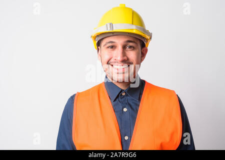 Face of happy Persian man construction worker smiling Stock Photo