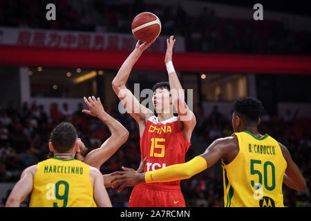 Zhou Qi, a professional Chinese basketball player, shoots during 2019  Zhouzhuang Cup Kunshan Men's International Basketball Championship against  Croa Stock Photo - Alamy