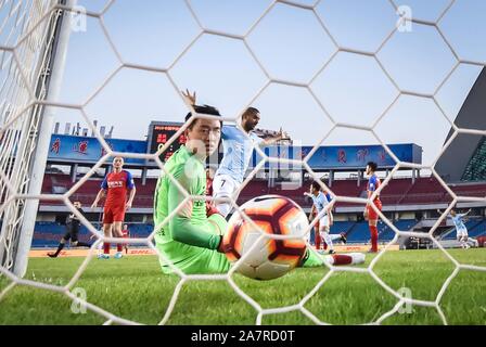 Brazilian football player Alan Douglas Borges de Carvalho, simply known as Alan, of Tianjin Tianhai F.C., celebrates during the 23th round of Chinese Stock Photo