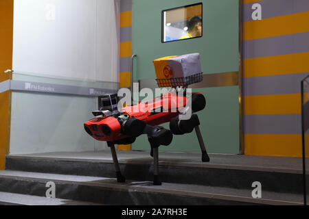 An intelligent quadruped robot dog regarded as a rescue worker is displayed during the 2019 Word Robot Conference (WRC) in Beijing, China, 20 August 2 Stock Photo