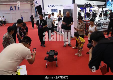 A four-legged robot dog called 'Laikago' developed by Unitree is displayed during the 2019 Word Robot Conference (WRC) in Beijing, China, 20 August 20 Stock Photo