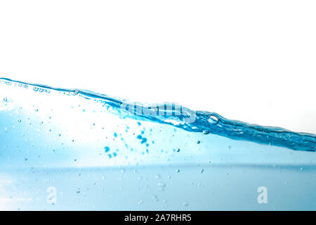 Water splash and air bubbles isolated over white background. Blue water wave abstract background isolated on white Stock Photo