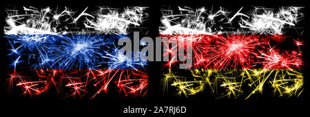 Russia, Russian vs South Ossetia New Year celebration sparkling fireworks flags concept background. Combination of two states flags. Stock Photo