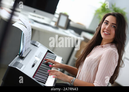 Perfect lady composing music Stock Photo