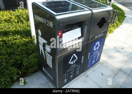 An artificial intelligence (AI) garbage sorting bin is displayed at Zhangjiang Hi-Tech Park in Shanghai, China, 17 August 2019.   Over 30 artificial i Stock Photo