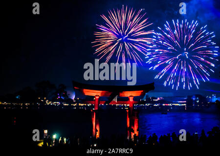Orlando, Florida. November 01, 2019. Japanese arch and spectacular fireworks at night background in Epcot (87). Stock Photo