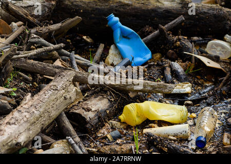 Plastic and styrofoam garbage pollution on shore. Stock Photo