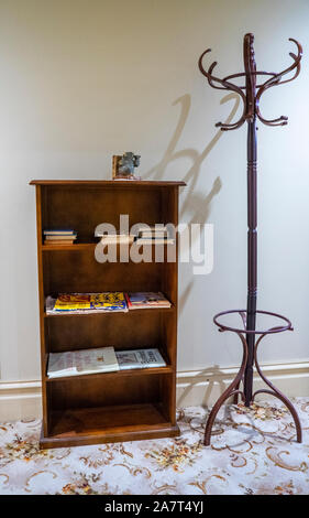 Display of a typical Australian hallway or corridor with bookcase and hatstand from 1930 to 1950 at National Wool Museum Geelong Victoria Australia. Stock Photo