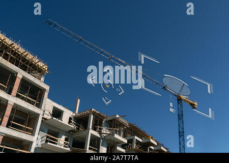 Remote-controlled unmanned crane. Digital transformation in construction industry. Stock Photo
