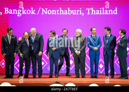 (191104) -- BANGKOK, Nov. 4, 2019 (Xinhua) -- (From L to R) Thai Prime Minister Prayut Chan-o-cha, Vietnamese Prime Minister Nguyen Xuan Phuc, Australian Prime Minister Scott Morrison, Brunei Sultan Haji Hassanal Bolkiah, South Korean President Moon Jae-in, Indian Prime Minister Narendra Modi, Indonesian President Joko Widodo, Japanese Prime Minister Shinzo Abe and Lao Prime Minister Thongloun Sisoulith attend a photo session during the 14th East Asia Summit in Bangkok, Thailand, Nov. 4, 2019. The summit is an annual regional event gathering 10 members of the Association of Southeast Asian Nat Stock Photo