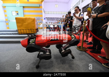An intelligent quadruped robot dog regarded as a rescue worker is displayed during the 2019 Word Robot Conference (WRC) in Beijing, China, 20 August 2 Stock Photo