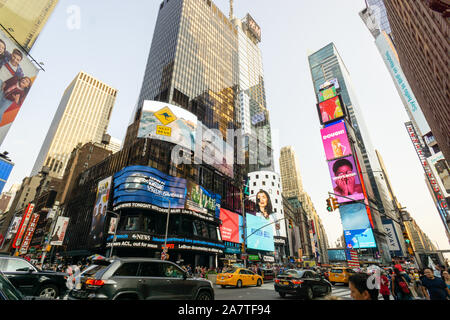 New York, USA - aug 20, 2018: Tourists in Times Square in the evening. More than 50 million people visit New York every year. Stock Photo