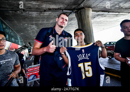 Nikola Jokic of Serbia national basketball team arrives at the Shenyang Taoxian International Airport ahead of the start of the FIBA World Cup in Shen Stock Photo
