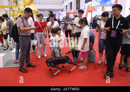 A four-legged robot dog called 'Laikago' developed by Unitree is displayed during the 2019 Word Robot Conference (WRC) in Beijing, China, 20 August 20 Stock Photo