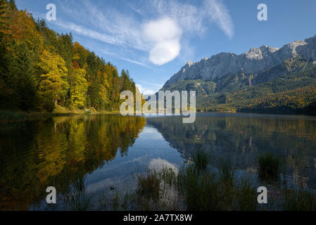 lake Eibsee and the Zugspitze in autumn, Bavaria, Germany Stock Photo