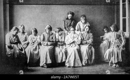 Vintage black and white photograph showing group of schizophrenic women suffering from the mental illness schizophrenia Stock Photo