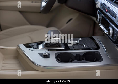 Russia, Izhevsk - April 4, 2019: Audi showroom. New Q7 Quattro with automatic transmission in dealer showroom. Famous world brand. Modern transportati Stock Photo
