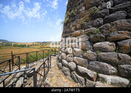 The central tower of basalt stone 17 meters high of the Nuraghe Santu Antine near Torralba, in the province of Sassari and the surrounding countryside Stock Photo