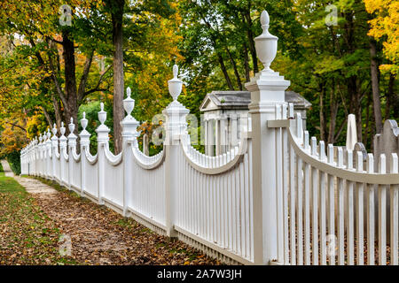 Charming New England picket fence with autumn foliage, Bennington, Vermont, USA. Stock Photo