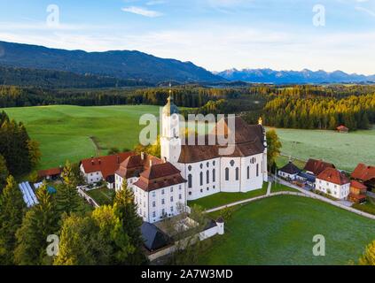 Wieskirche in the morning light, pilgrimage church to the Scourged Saviour on the Wies, Wies, near Steingaden, Pfaffenwinkel, aerial view, Upper Stock Photo