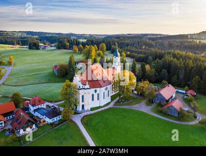 Wieskirche in the morning light, pilgrimage church to the Scourged Saviour on the Wies, Wies, near Steingaden, Pfaffenwinkel, aerial view, Upper Stock Photo