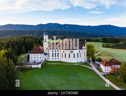 Wieskirche in the morning light, pilgrimage church to the Scourged Saviour on the Wies, Wies, near Steingaden, Pfaffenwinkel, aerial view, Upper Stock Photo