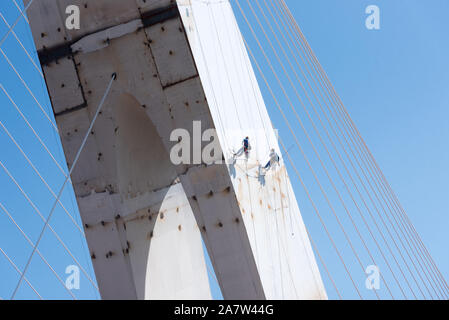 Construction workers work on the pillars of the New Beijing Shougang Bridge in Beijing, China, 21 August 2019. Stock Photo
