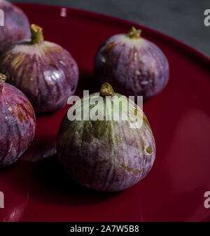 fresh figs close-up on black background. dark moody photo Stock Photo