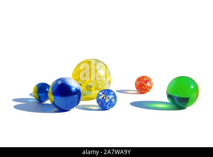 Bag of marbles and beads isolated on white background Stock Photo