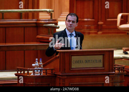 (191104) -- BUCHAREST, Nov. 4, 2019 (Xinhua) -- Ludovic Orban, leader of the Romanian National Liberal Party, addresses a parliament session in Bucharest, capital of Romania, on Nov. 4, 2019. The Romanian National Liberal government won a vote of confidence in parliament on Monday, replacing the Social Democrats who had been in power for nearly three years. (Photo by Cristian Cristel/Xinhua) Stock Photo