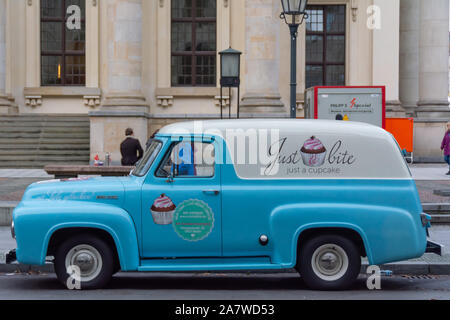 Berlin, Berlin / Germany - November 20, 2015:  Model Ford F-100 truck in blue, with an advertising design from the cupcake shop 'just a bite' Stock Photo