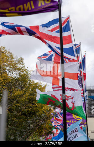 London, United Kingdom - October 25: Pro-Brexit activists installed a wall of Union Jacks and other flags across the road from Parliament. Stock Photo