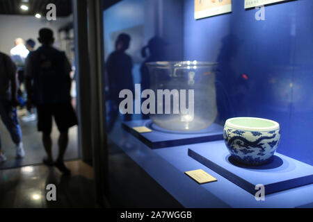 A ceramic ware featuring goldfish patterns is displayed at the Yanxi Palace, also known as the Palace of Prolonging Happiness, of the Palace Museum, a Stock Photo