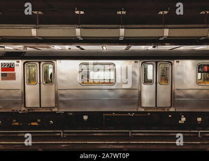 The outside of a passing subway train in New York City, New York, USA. Stock Photo
