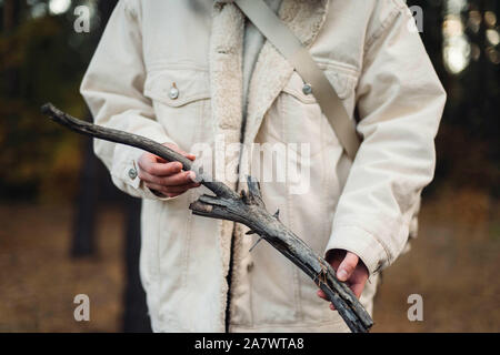 woman holding branch Stock Photo