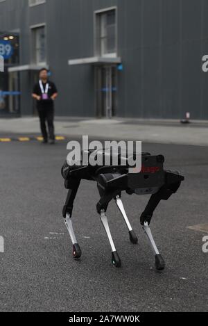 A four-legged robot dog called 'Laikago' developed by Unitree is displayed during the 2019 Word Robot Conference (WRC) in Beijing, China, 20 August 20 Stock Photo