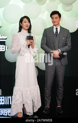 Chinese singer and actress Victoria Song or Song Qian, left, and actor Zhou Yiwei attend a promotional event for Hennessy in Hangzhou city, east China Stock Photo