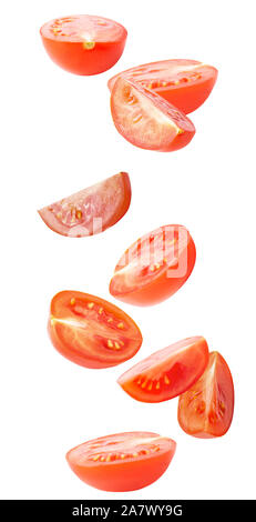 Vibrant falling vegetables isolated on white background Stock Photo