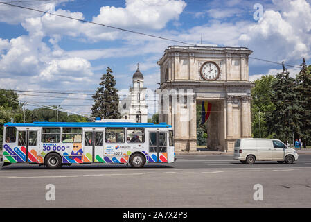 Triumphal arch on the Great National Assembly Square in Chisinau, capital of Moldova, view with Cathedral of Christs Nativity on background Stock Photo