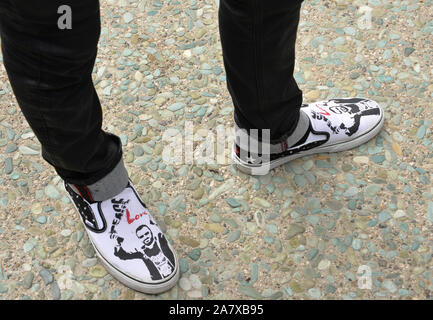 LOS ANGELES, CA - JULY 7, 2015: Ringo Starr's shoes, with 'Peace and Love' logo, at photocall at Capitol Records, Hollywood, to celebrate his 75th birthday. © 2015 Paul Smith / Featureflash Stock Photo