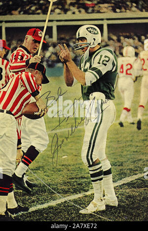 New York Jets' quarterback Joe Namath, right, is mobbed as he