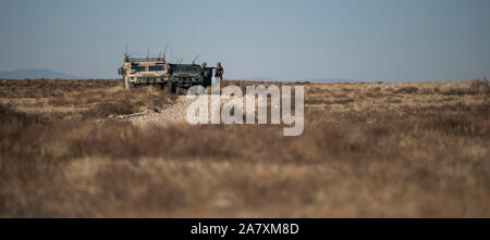 Special warfare tactical air control party Airmen with the 124th Air Support Operations Squadron participate in field training at the Orchard Combat Training Center, south of Boise, Idaho, Nov. 2, 2019. The training included working hand-in-hand with both the 366th Fighter Wing’s explosive ordnance Airmen and the German Artillery Battalion. (U.S. Air National Guard photo by Senior Master Sgt. Joshua C. Allmaras) Stock Photo