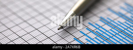 Silver pen lies on paper documents with color Stock Photo