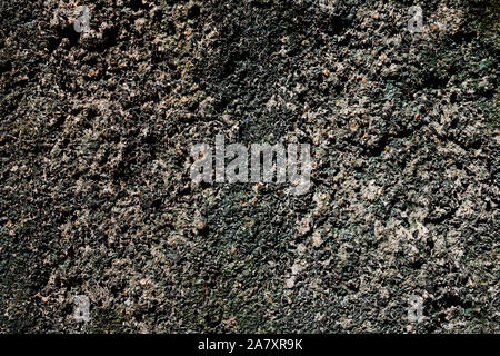 Rough asphalt texture. Stone asphalt texture background black granite gravel. Backdrop, bitumen, brown, bumpy, close, close-up, closeup, concrete, con Stock Photo