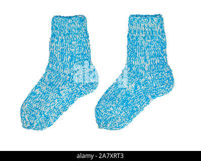 Two blue knitted wool socks on a white isolated background. Stock Photo