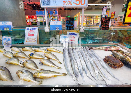 Fish section at a Carrefour Supermarket in Malaga Spain Stock Photo - Alamy