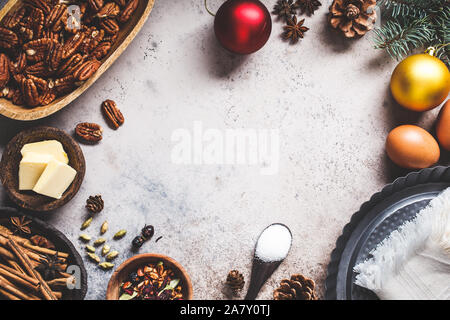 Christmas holiday baking background. Ingredients for the holiday cake on a gray background. Stock Photo