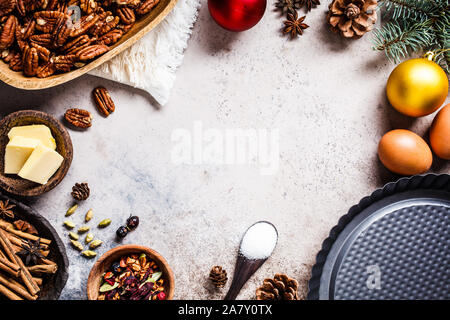 Christmas bakery background. Ingredients for the holiday cake on a gray background. Stock Photo