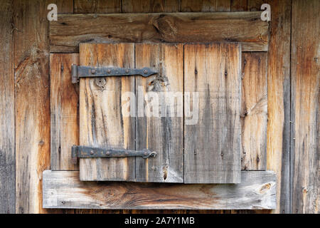 Closeup of wooden shuttered window at the Museum of Lachine or Musée de Lachine in the 17th-century Maison Ber-Le Moyne house, Montreal, Quebec, Canad Stock Photo