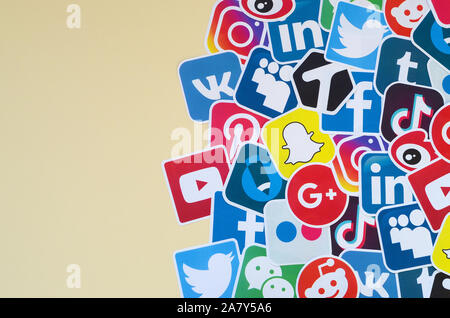 KHARKOV, UKRAINE - OCTOBER 17, 2019: Many paper icons with logo of most popular social networks and smartphone apps for chat and conversations online Stock Photo